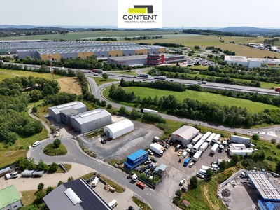 Pronájem zpevněného pozemku o velikosti 2.677 m² na D1, exit 15 - 74679